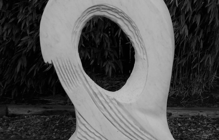 'Big Wave Vortex' by Tom Allan is a marble sculpture depicting a wave cresting over negative space, made in 2011.